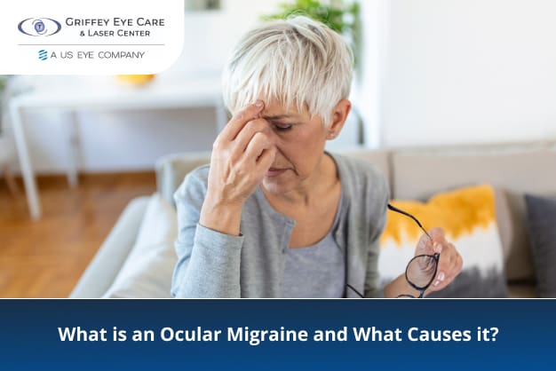 Older woman holding her head and glasses, experiencing vision discomfort from an ocular migraine.